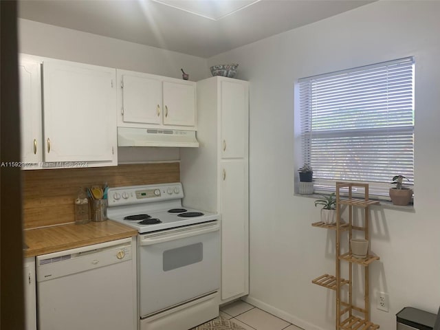 kitchen featuring white cabinetry, white appliances, and light tile floors