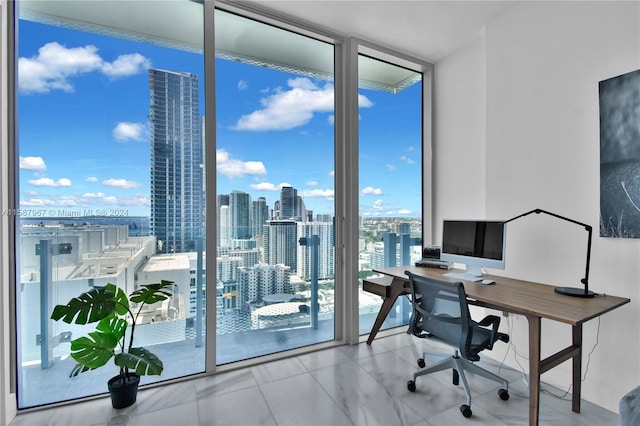 tiled office with a wall of windows