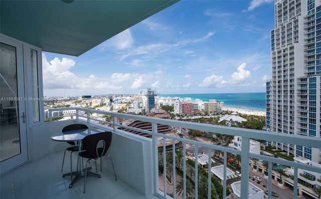 balcony featuring a water view