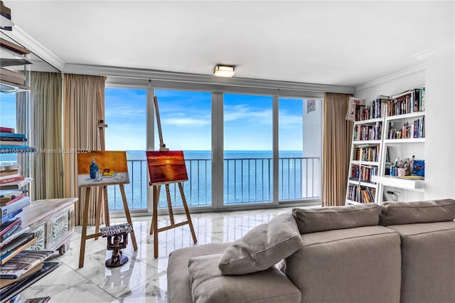 living room with a healthy amount of sunlight, a water view, and ornamental molding