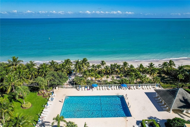 aerial view featuring a water view and a view of the beach