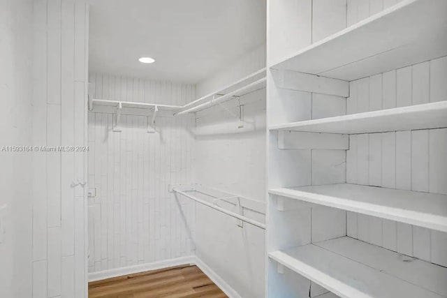 walk in closet featuring light wood-type flooring