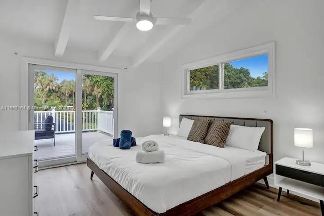 bedroom featuring access to outside, lofted ceiling with beams, light wood-type flooring, and ceiling fan