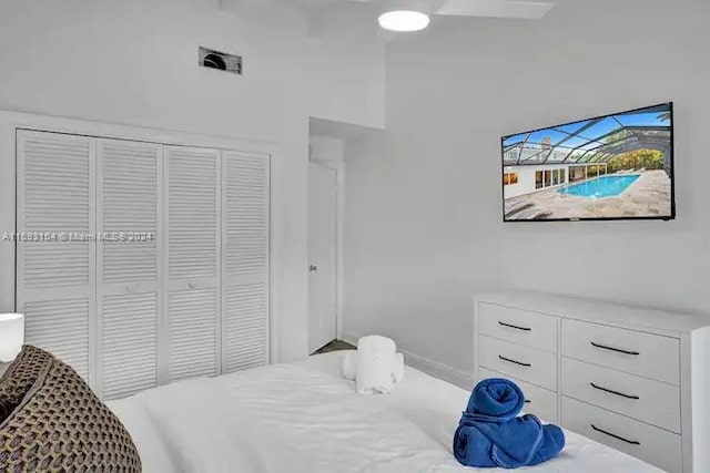 bedroom featuring a closet and ceiling fan