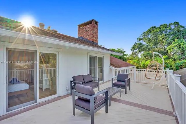 deck with outdoor lounge area