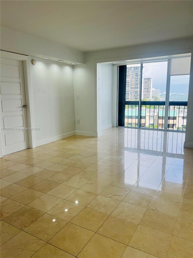 living room featuring light tile patterned flooring