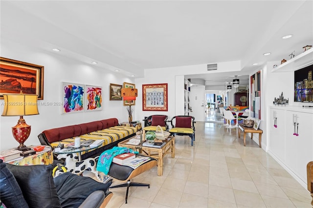 living room with light tile patterned flooring