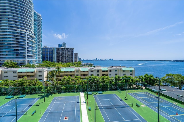 view of sport court featuring a water view