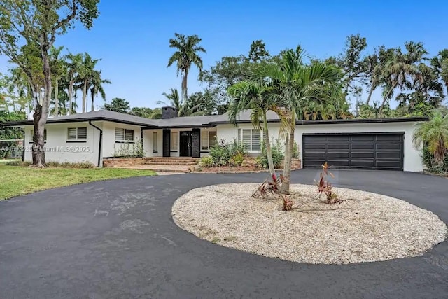 ranch-style house with a garage