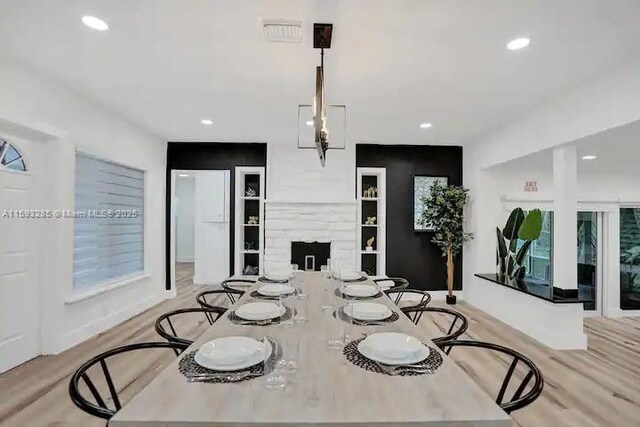 dining room featuring light hardwood / wood-style flooring