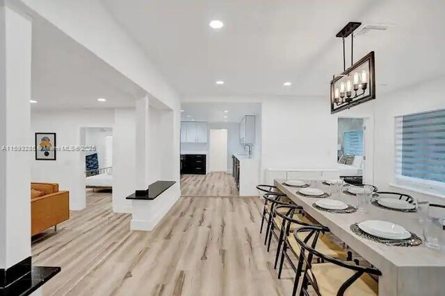 kitchen featuring stainless steel appliances and white cabinets