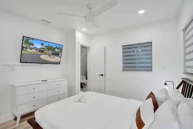 bedroom featuring ceiling fan and light hardwood / wood-style floors