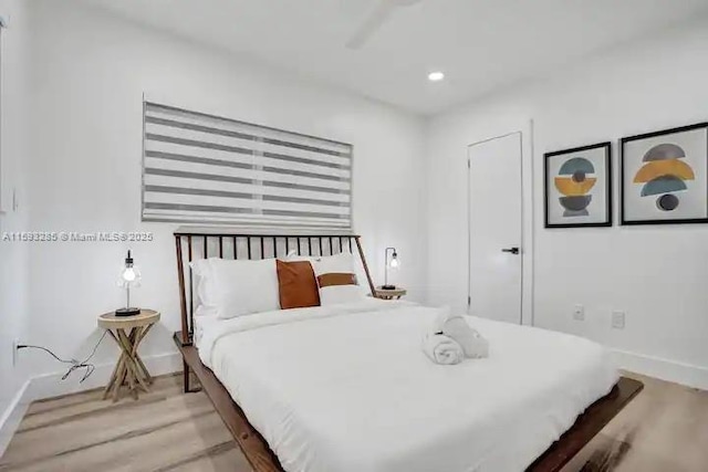 bedroom featuring hardwood / wood-style floors