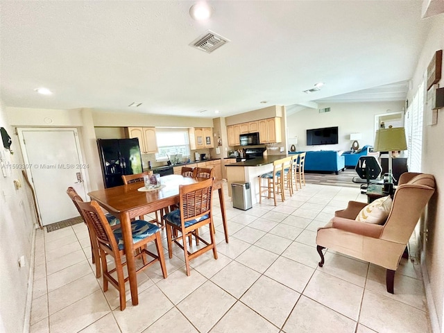 dining room featuring light tile flooring