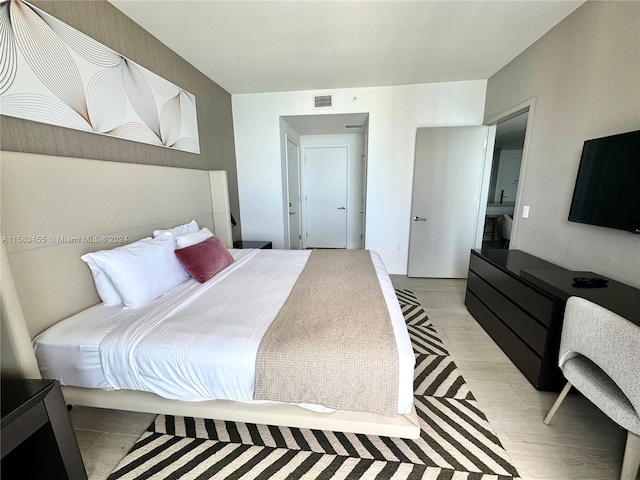 bedroom featuring light hardwood / wood-style floors