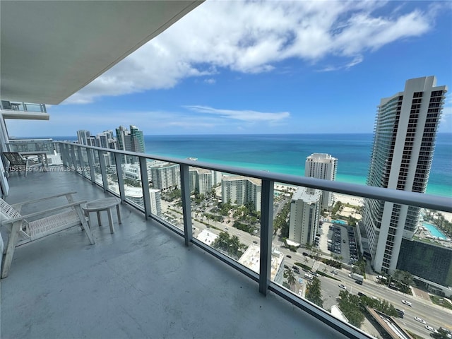 balcony featuring a water view