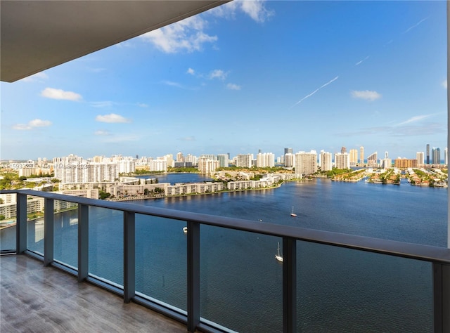 balcony featuring a water view