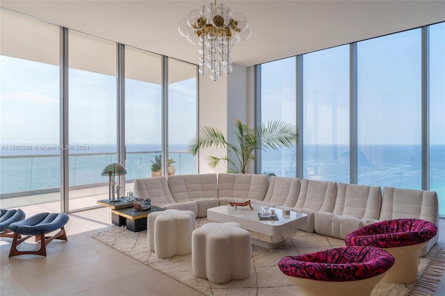 interior space featuring a water view and an inviting chandelier