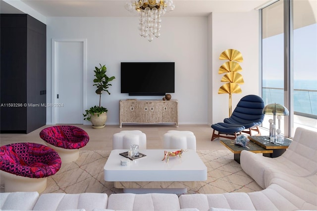 living room with a notable chandelier and floor to ceiling windows