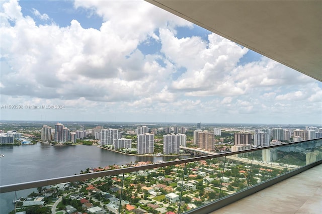 balcony with central AC and a water view