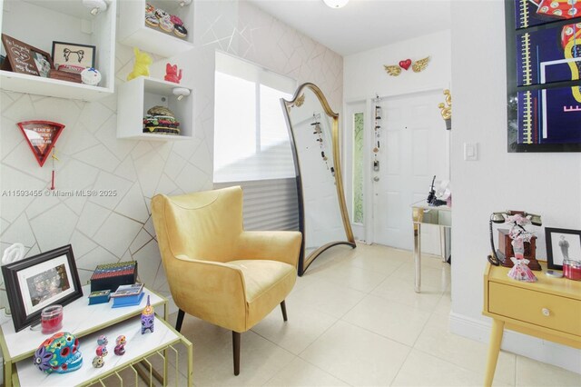 sitting room with light tile floors