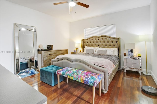 bedroom with ceiling fan and dark hardwood / wood-style floors