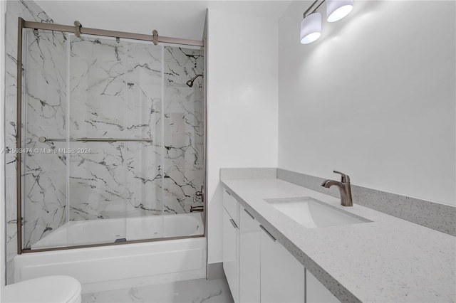 full bathroom with tile patterned floors, toilet, vanity, and tiled shower / bath