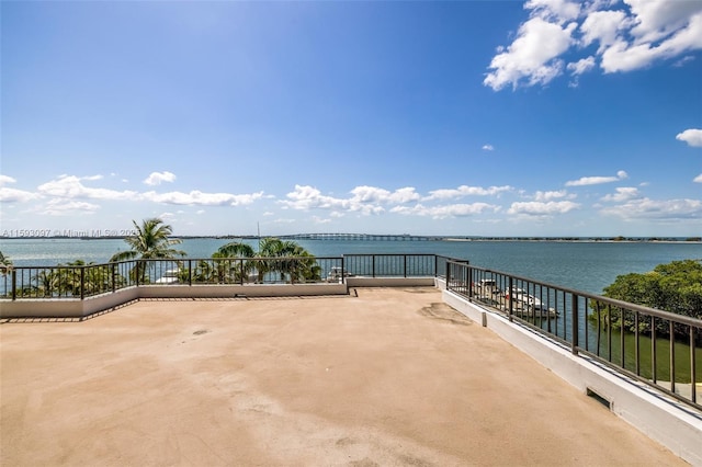 view of patio / terrace with a water view