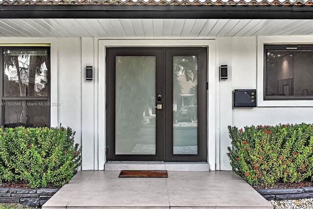 doorway to property with french doors