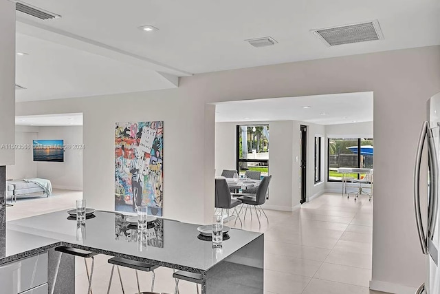 office space featuring light tile patterned flooring