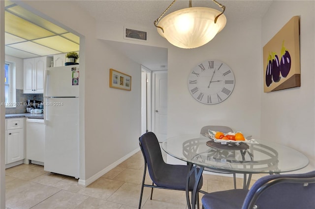 view of tiled dining space