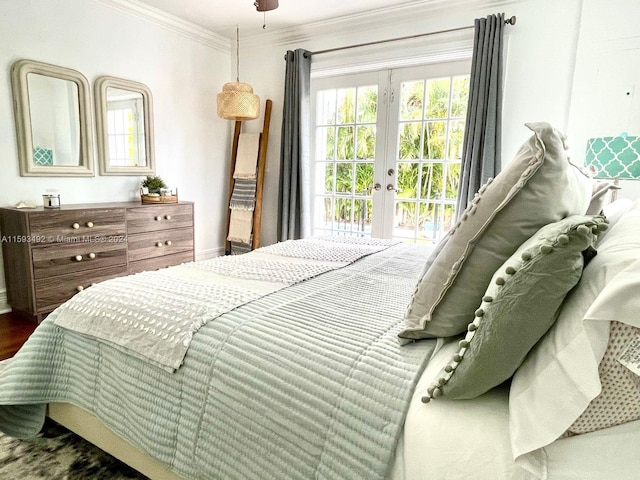 bedroom featuring crown molding, access to outside, and french doors