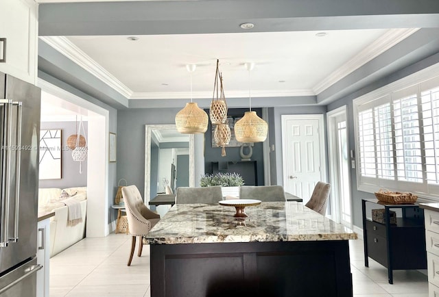 tiled dining space with ornamental molding