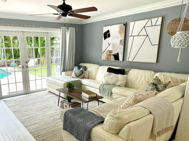 living room featuring crown molding, tile patterned flooring, french doors, and ceiling fan