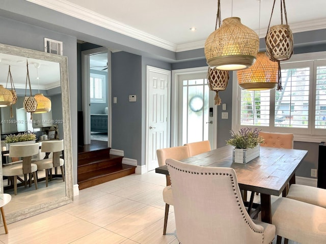 tiled dining area with ornamental molding