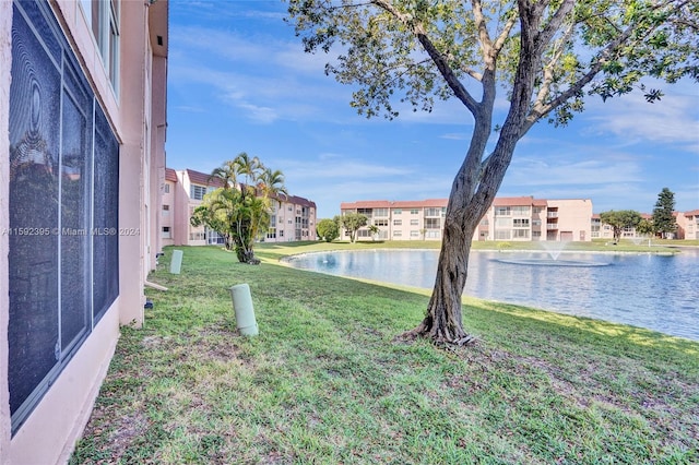 view of yard with a water view