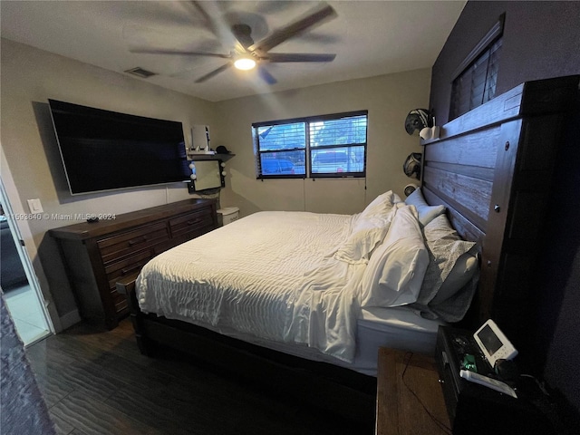 bedroom featuring ceiling fan and wood-type flooring