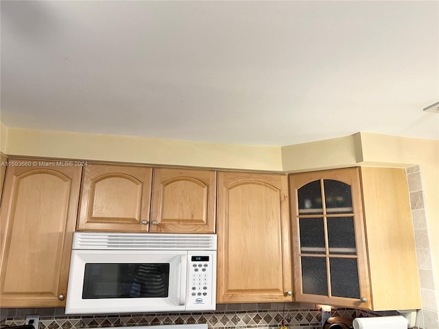 kitchen featuring light brown cabinets