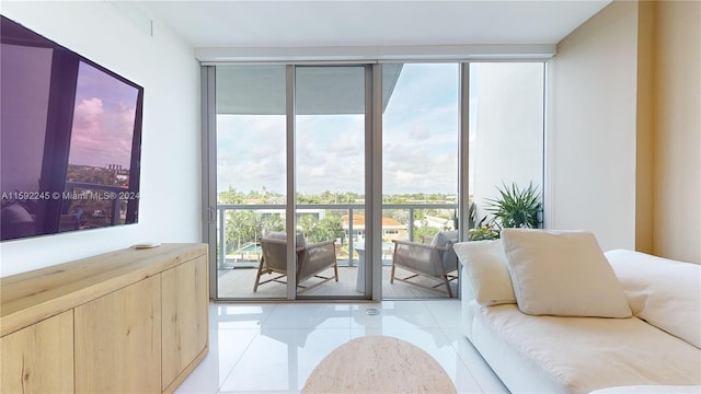 tiled living room with expansive windows