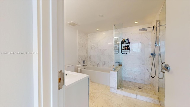 bathroom with shower with separate bathtub