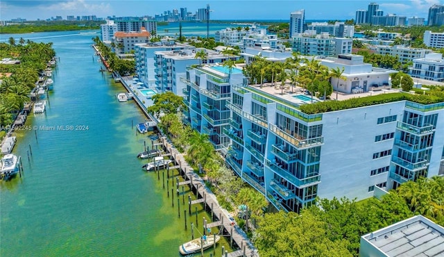 birds eye view of property featuring a water view