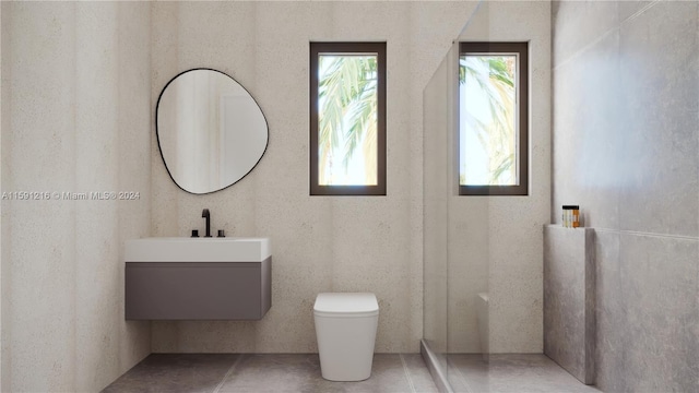 bathroom featuring walk in shower, vanity, and toilet