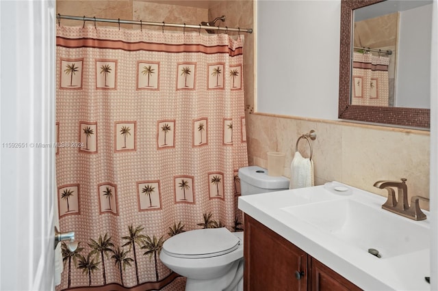 bathroom featuring vanity with extensive cabinet space, backsplash, toilet, and tile walls