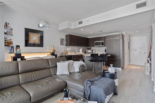 living room featuring light hardwood / wood-style flooring