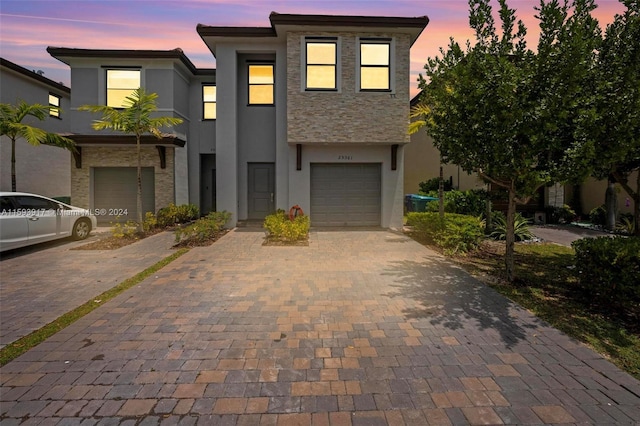 view of front of home with a garage