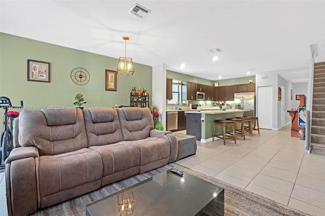 tiled living room with sink