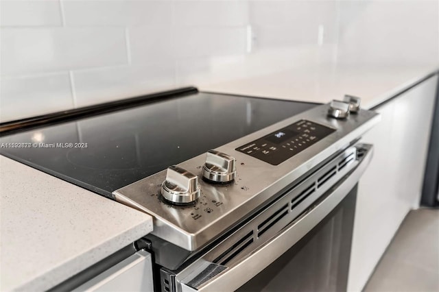 interior details with stainless steel electric range