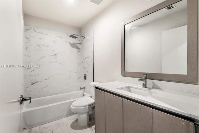 full bathroom featuring tile flooring, tiled shower / bath combo, vanity, and toilet