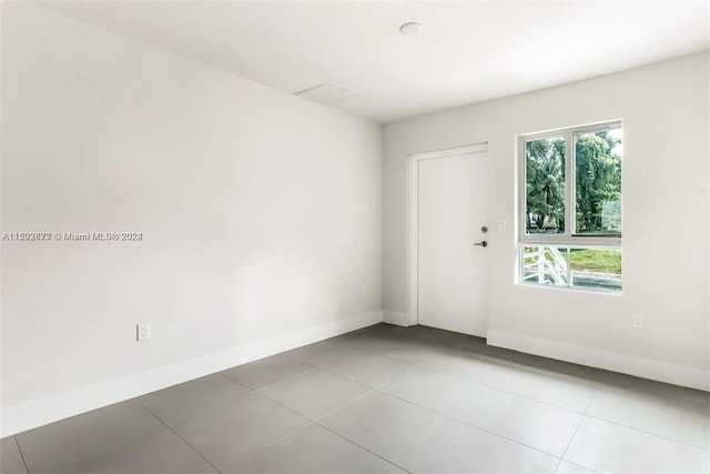 view of tiled spare room