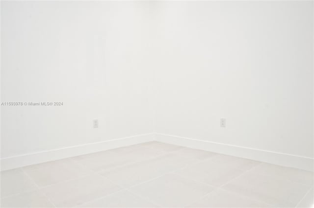 empty room featuring tile patterned flooring